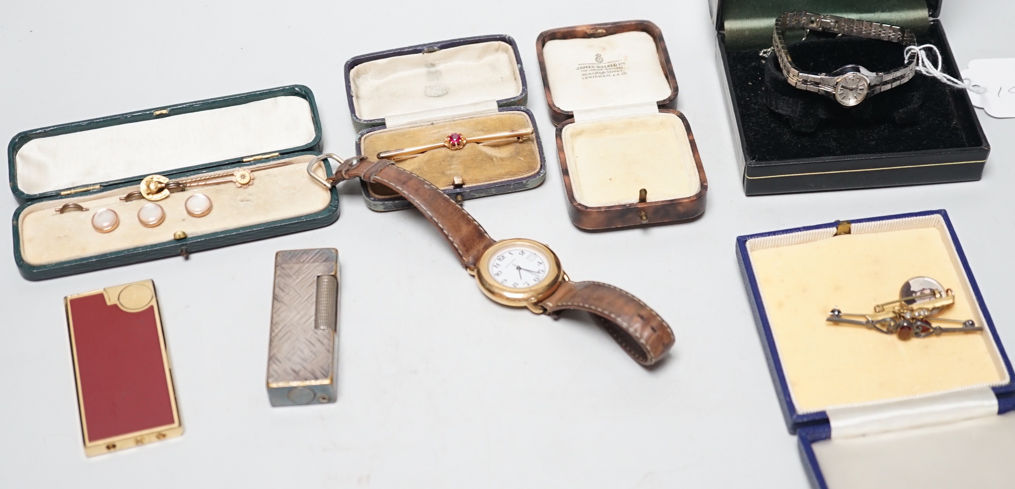 Mixed jewellery and other items including a 15ct fox head and horseshoe stick pin, a 9ct and diamond chip set stick pin, gem set yellow metal bar brooch, dress studs, lighters, lady's Rotary wrist watch, etc.
